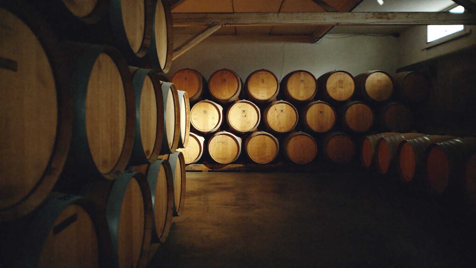 The Larrow barrel room, French oak barrels stacked two high